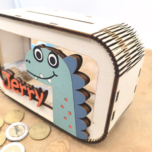 Dino Spardose personalisiert mit Namen in Wunschfarben, Sparbüchse, Sparschwein, Geldgeschenk, Geschenk Geburt, Taufe Geburtstag Dinosaurier