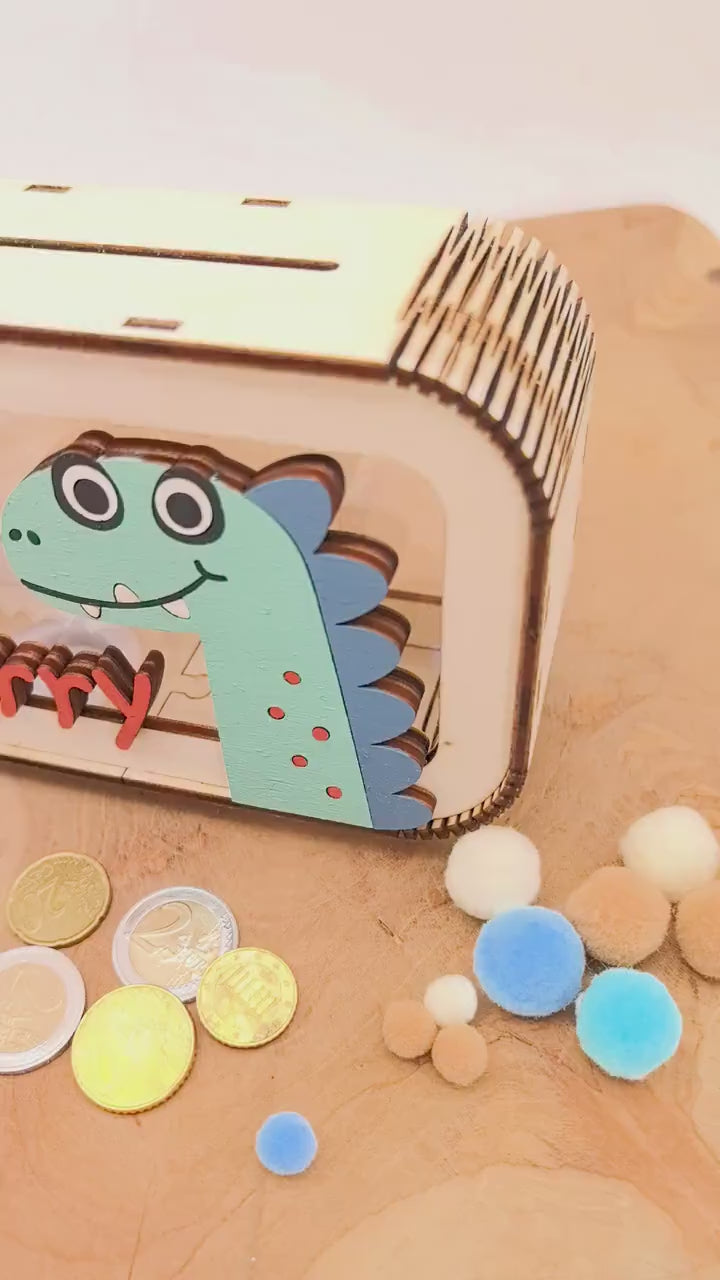 Dino Spardose personalisiert mit Namen in Wunschfarben, Sparbüchse, Sparschwein, Geldgeschenk, Geschenk Geburt, Taufe Geburtstag Dinosaurier